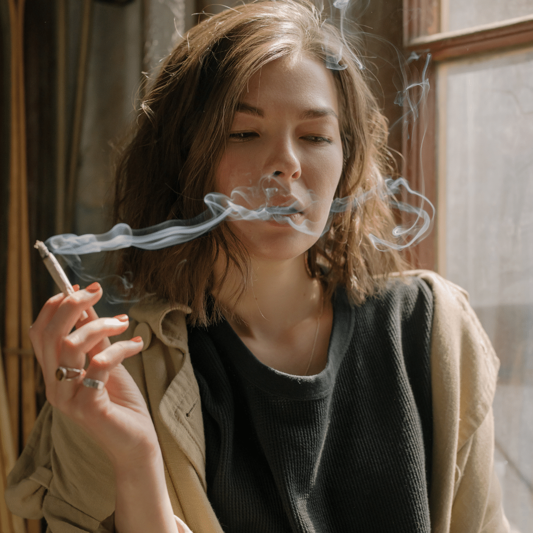 woman smoking cigarette